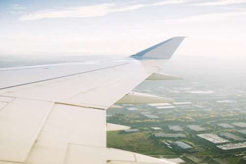 Airplane Wing Flying Sky Free Photo