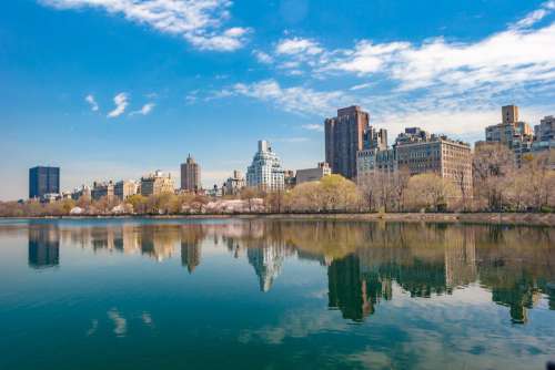 Buildings River Blue Sky Free Photo