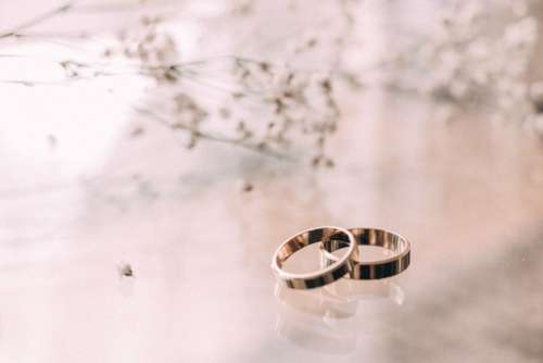 Wedding Rings Glass Table Free Photo