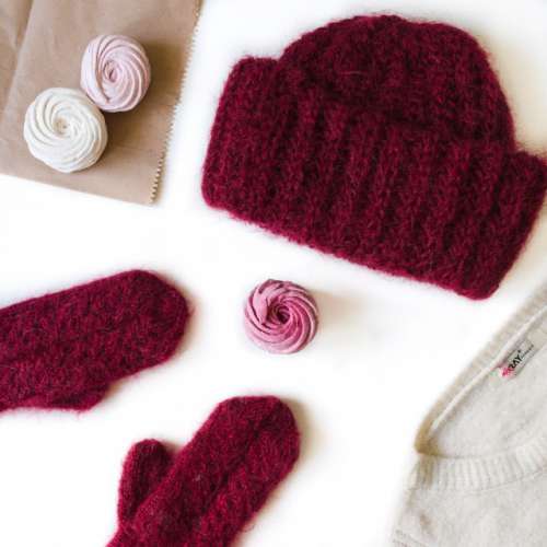 Knitted hat and gloves overhead view 