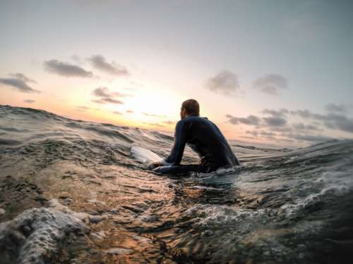 Surfing at the sunset