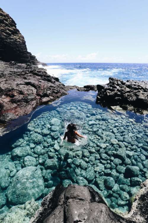 jumping into crystal clear tidepools💧