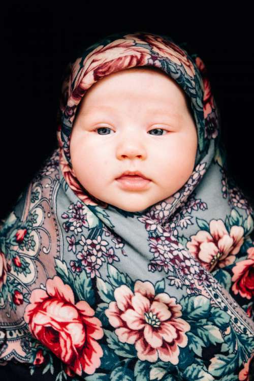 child in a shawl