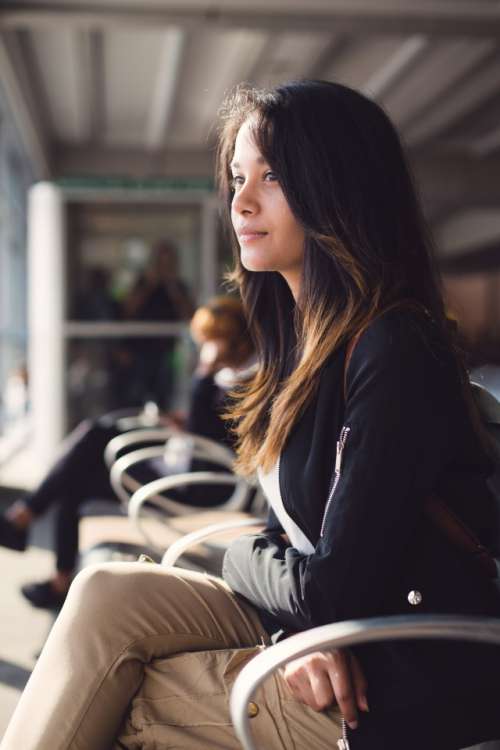 Teenage girl waiting at airport lounge