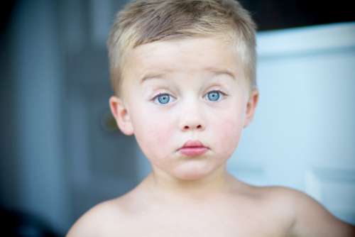 Little boy with Blue eyes; In shock 