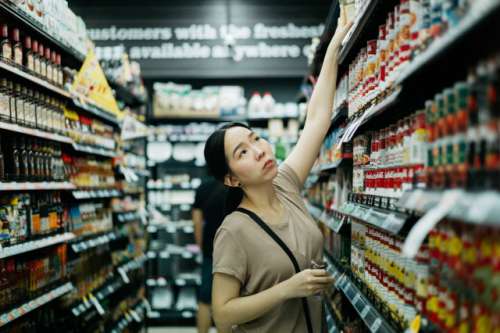 Woman shopping in supermarket 
