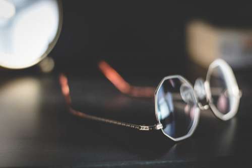 Glasses on a bedside table.