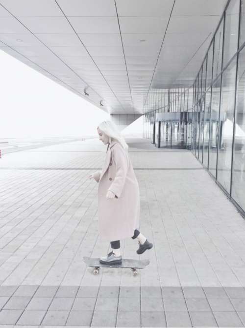 the girl skates on a skateboard