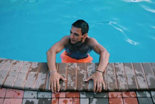 Man on swimming pool