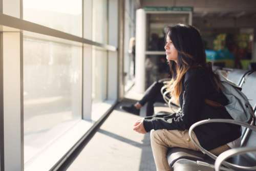 Teenage girl waiting at airport lounge