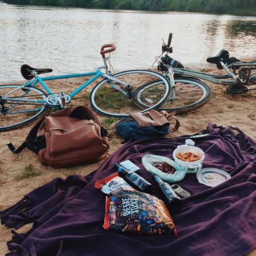 evening picnic on the sandy beach on the lake