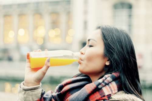 woman drinking juice