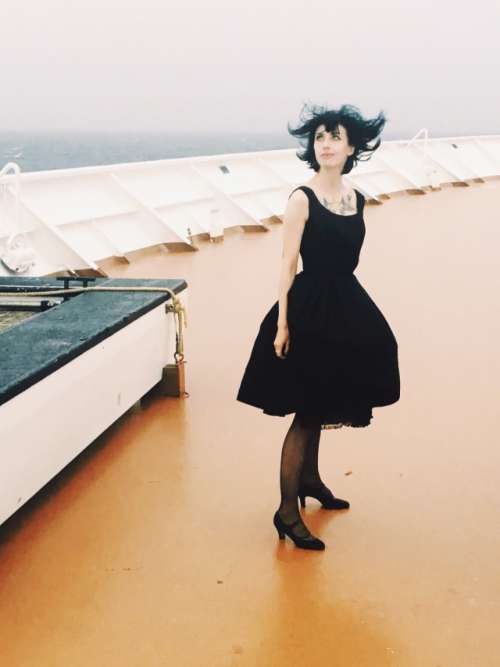 Vintage formal wear on the deck of a cruise ship 