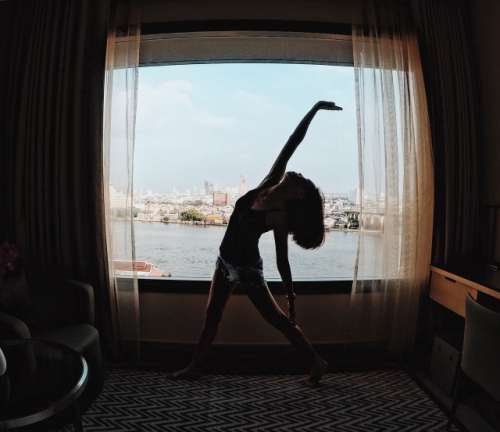 Yoga pose by the window. 