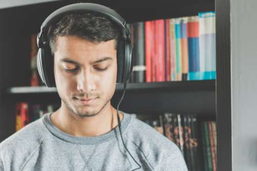 Man listening to music on headphones.