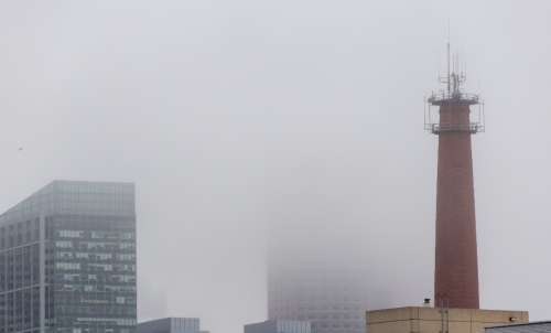 city fog buildings mist brick