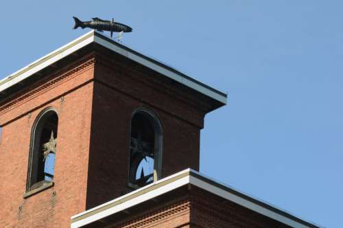 brick mill building tower weathervane