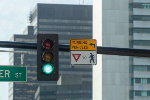 city traffic light green street