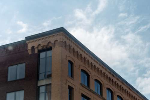 city building angle brick sky