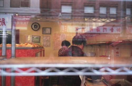 street shop window restaurant workers