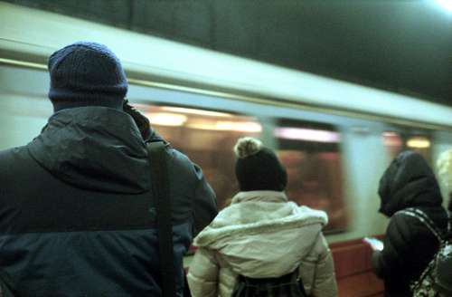 city subway commuters pedestrians urban