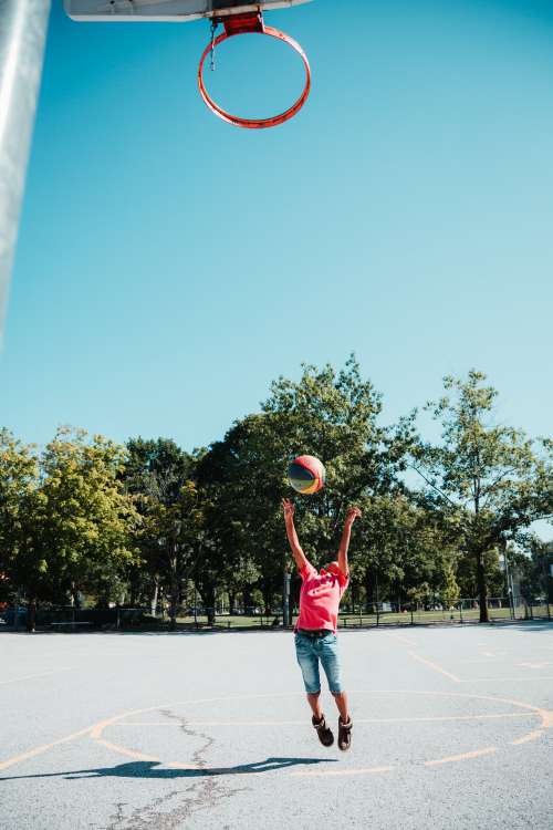 Jumping To Score Photo