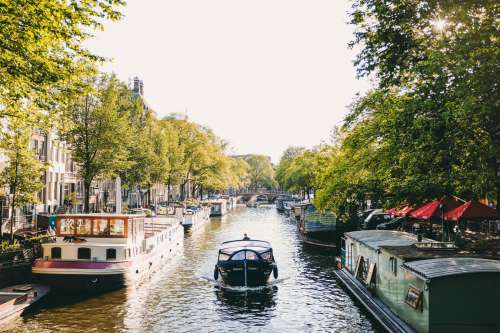 Shaded Canal In Amsterdam Photo