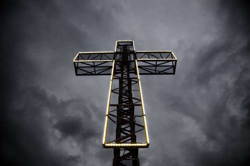 Cross Lit up With Electric Lights Photo