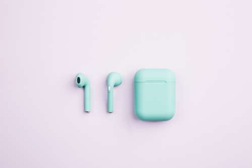 Green Earbuds And Case Photo