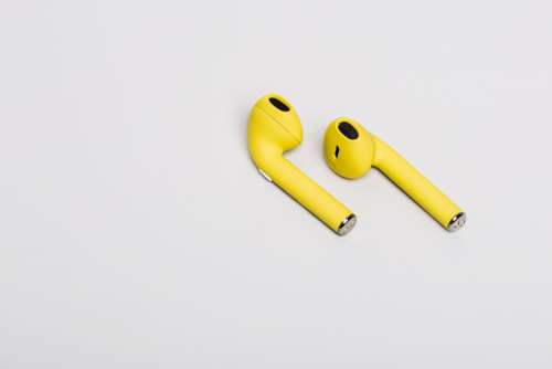 Pair of Yellow Earbuds Photo