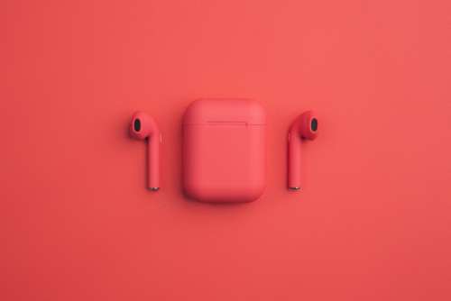 Red Earbuds And Smartphone Photo