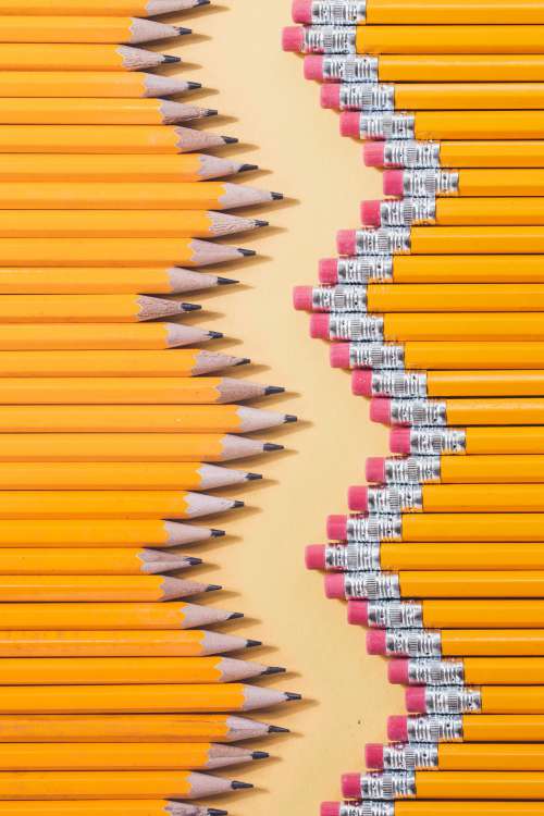 Yellow Pencils Laid Out In Zig Zag Pattern Photo