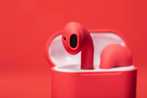 Red Earbuds In Case Photo