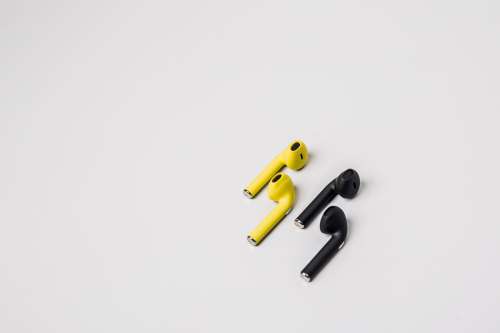 Black And Yellow Earbuds Photo