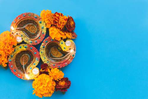 Diwali Diya On Blue Photo