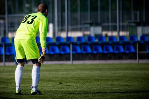 Football goalkeeper in action during a match