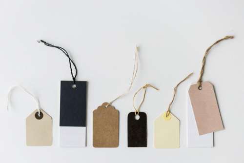 A collection of blank clothing tags