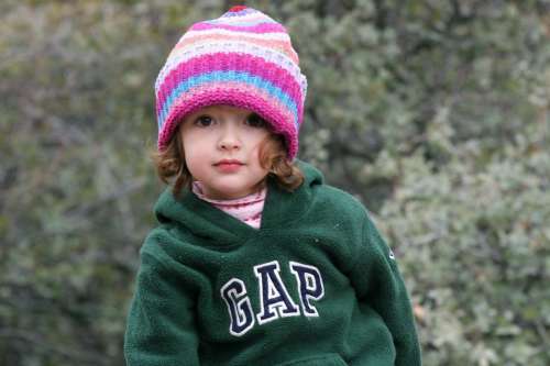 Little kid in a knit cap