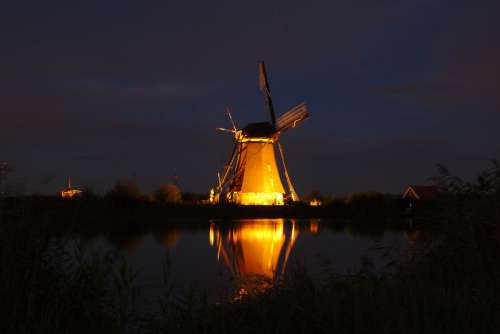 windmills mills evening lighting windmill