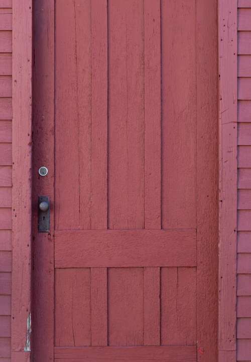 red door wooden building barn