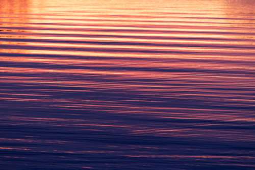 rippled water lake waves sunlight