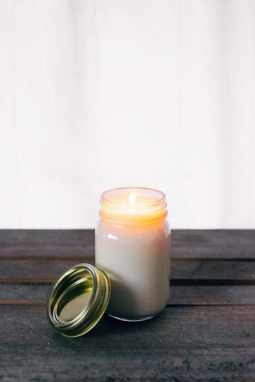 candle table light jar flame