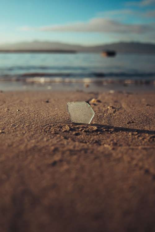 Sea Glass In The Sand Photo