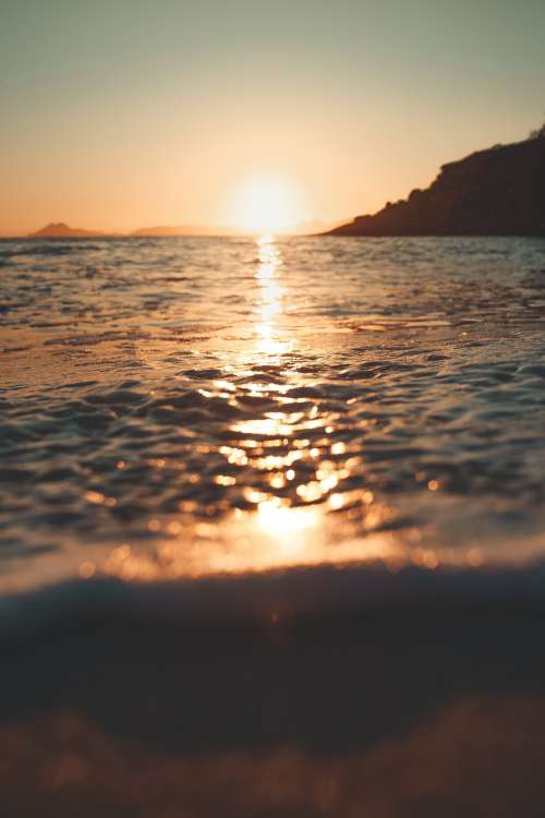Sunlight Streaked Sea Photo