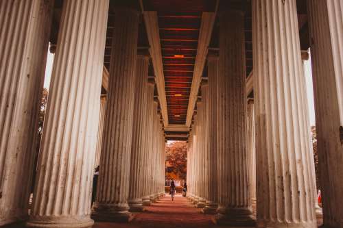 An Open Walkway Lined With Columns Photo