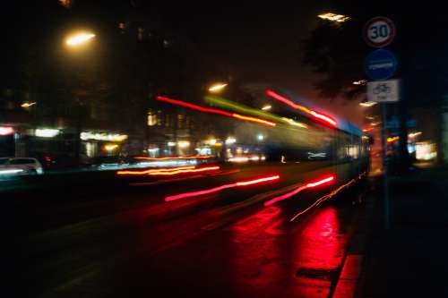 Bus Speeds In The Night Photo