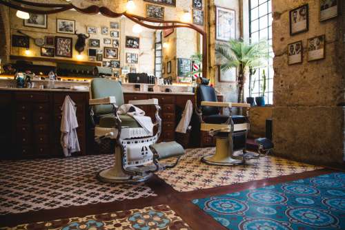 Quaint Barbershop With Eclectic Decor Photo