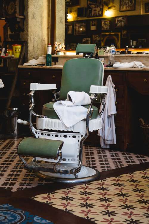 Green Vintage Chair In Barbershop Photo