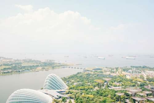 A Hazy Skyline Ocean View Of Singapore Photo