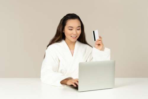 Young Asian Woman Doing Online Shopping